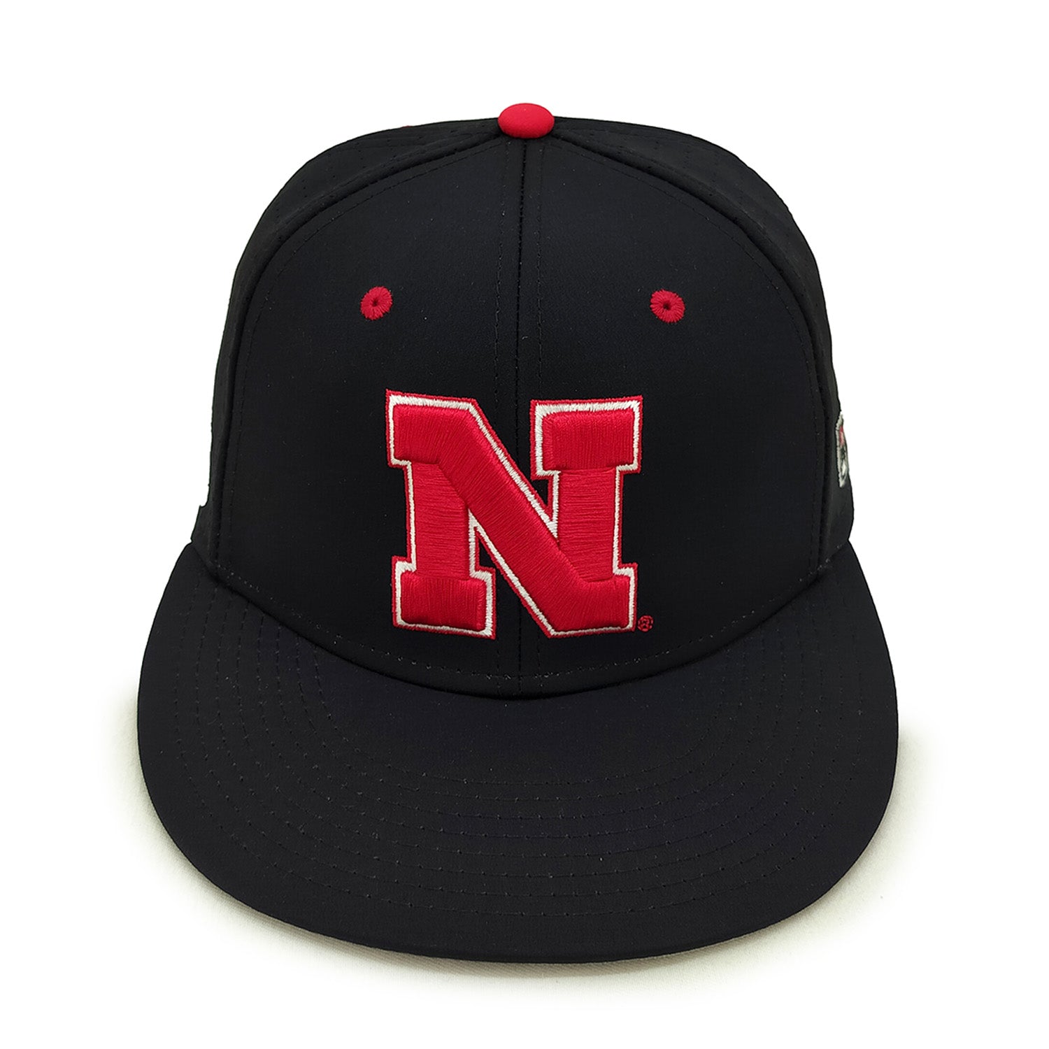 Perforated Gamechanger in American Black Fitted Hat, Flat Bill, Fitted - Nebraska Cornhuskers