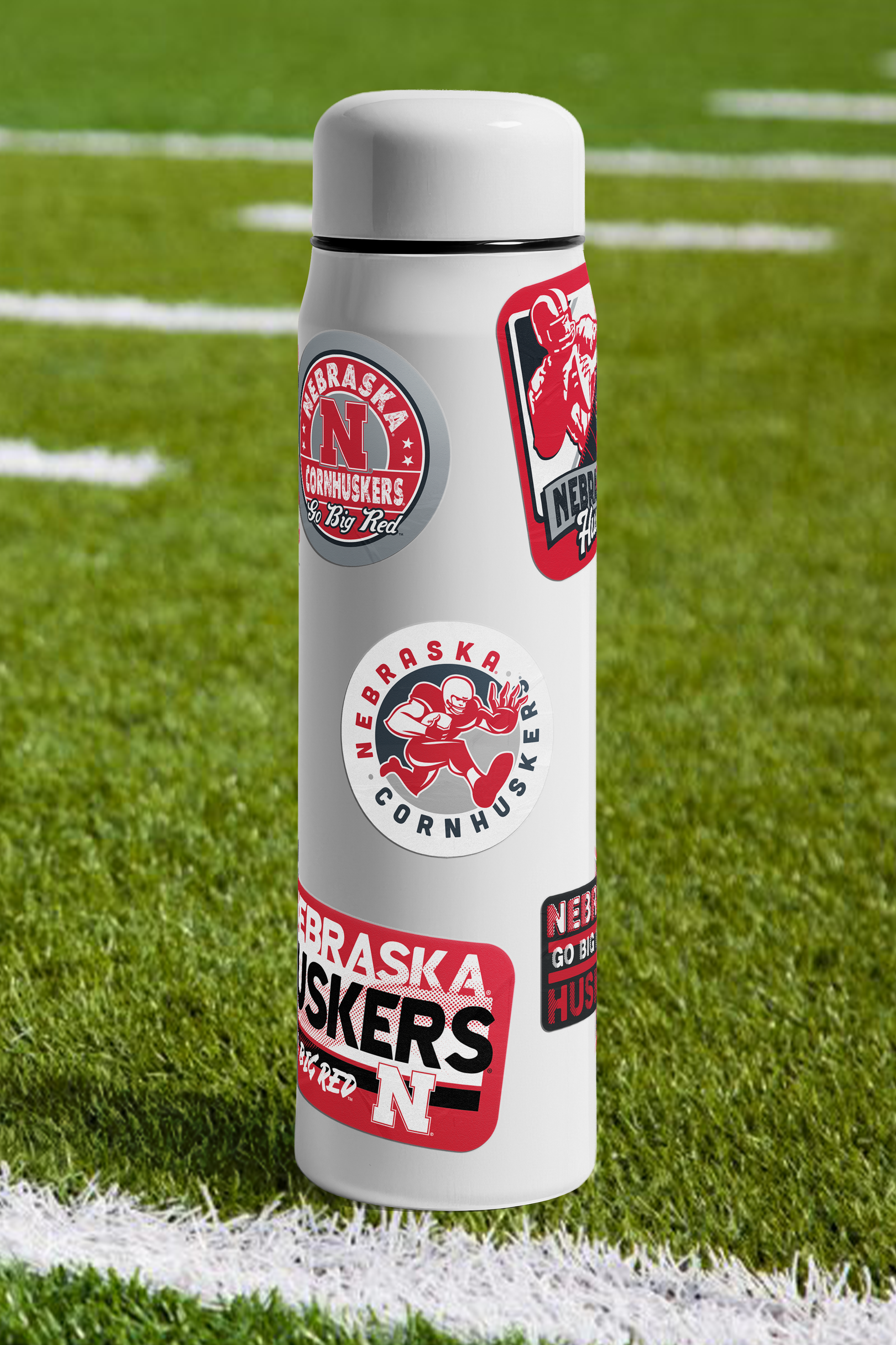 Rugged Charging Football Player Vintage Sticker - Medium - Nebraska Cornhuskers