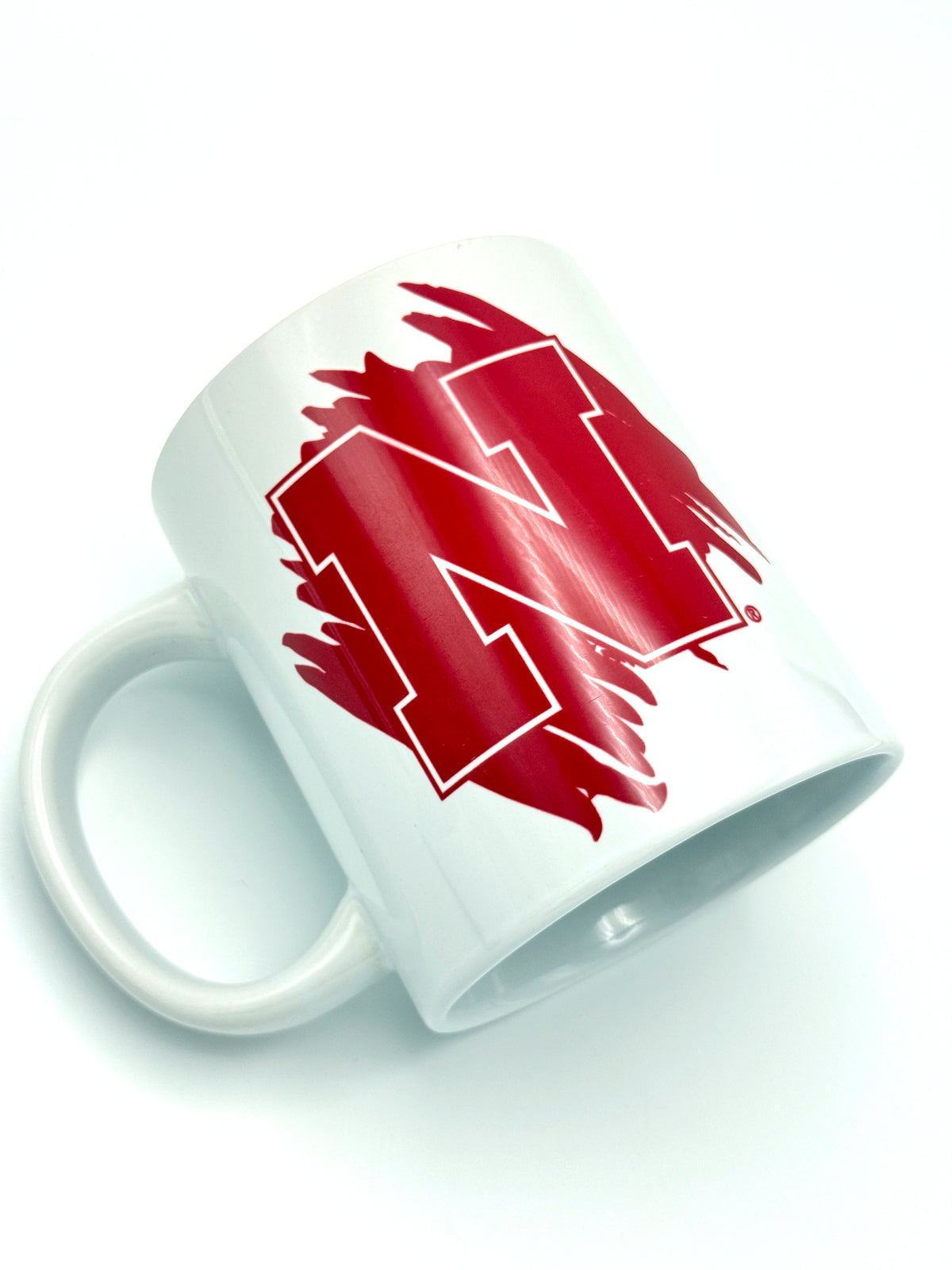 Splatter Paint Nebraska Cornhuskers Mug