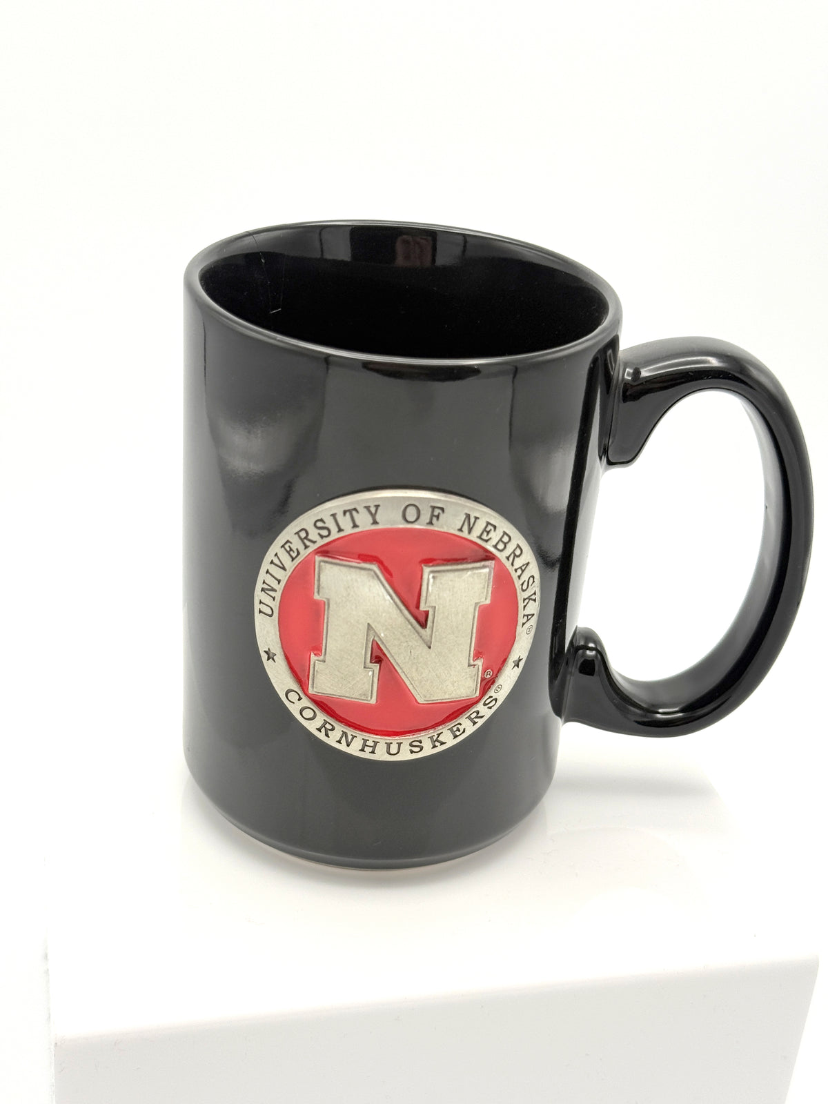 Black Ceramic Mug with Metal Emblem Nebraska Cornhuskers
