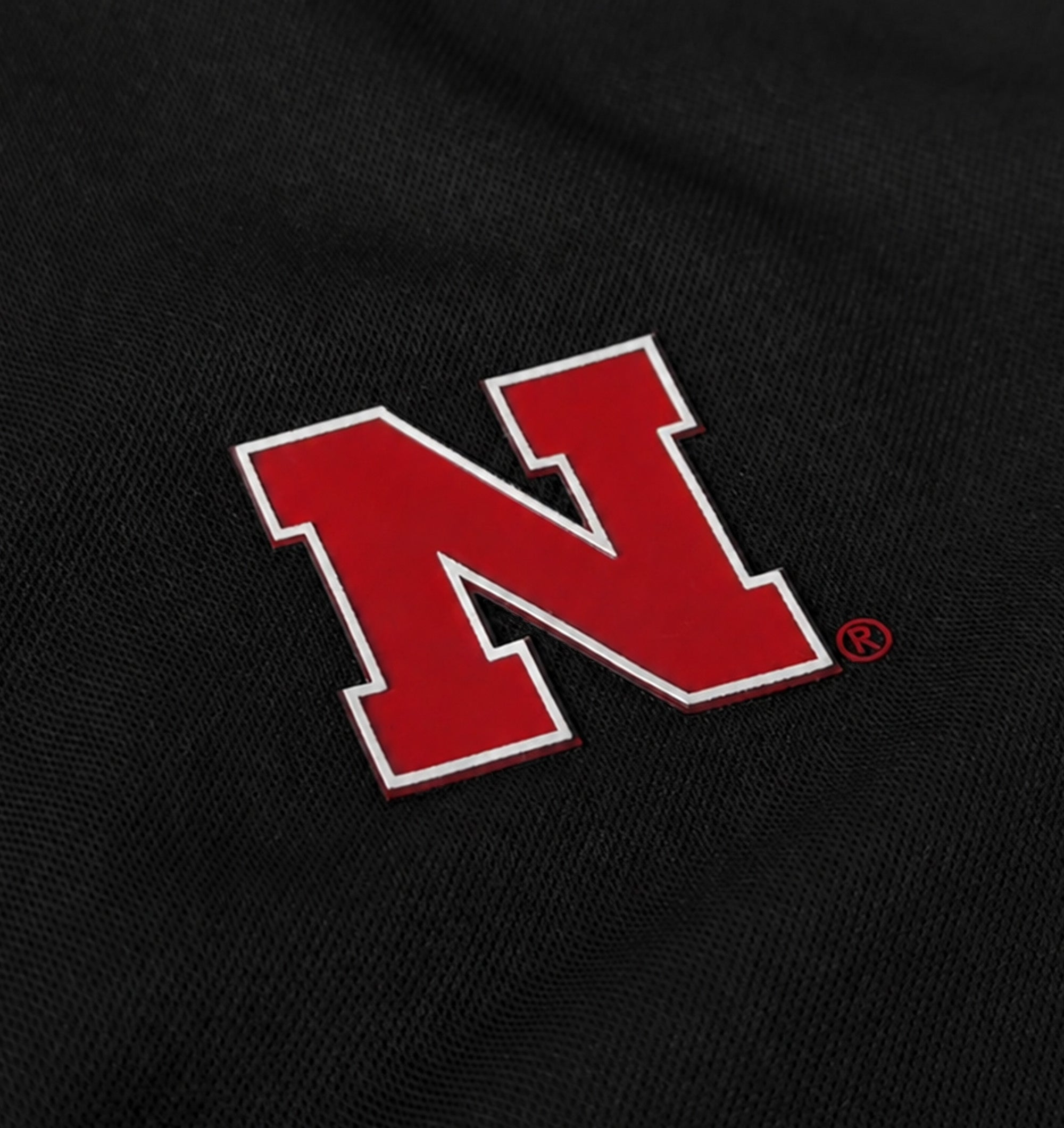 UNRL Pique Pro Polo in Black - Nebraska Cornhuskers