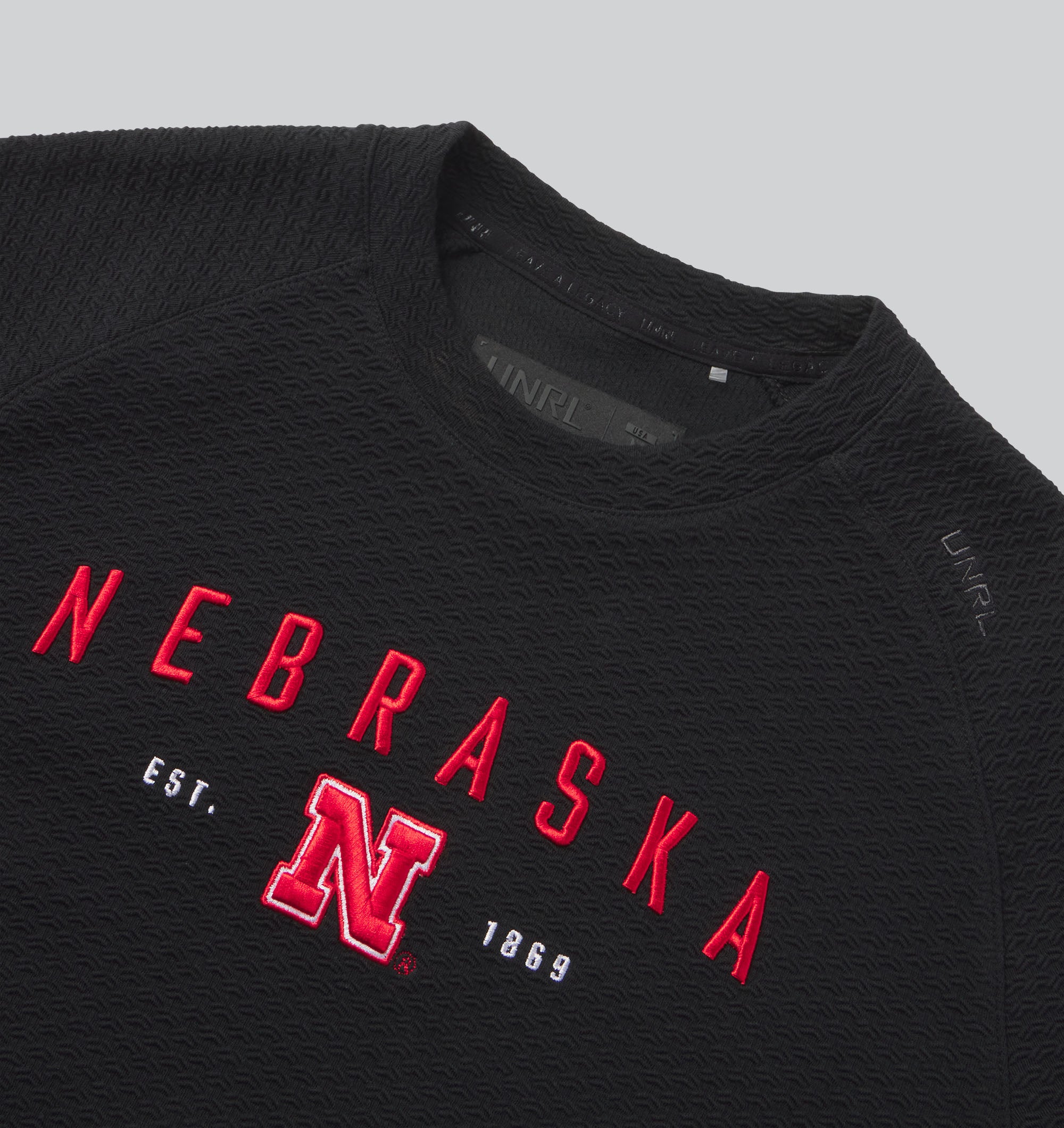 UNRL Elevation Crewneck in Black - Nebraska Cornhuskers