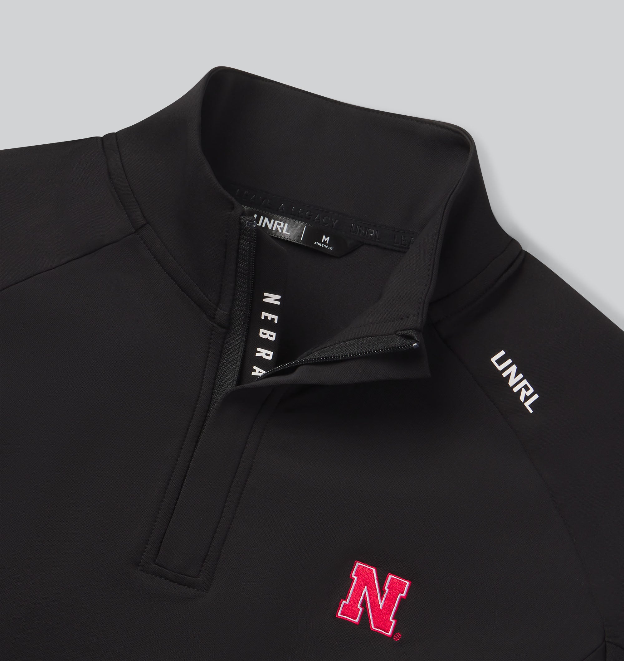 UNRL Highlands Quarter Zip in Black - Nebraska Cornhuskers
